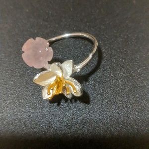 Adjustable rose quartz lotus ring with silver band